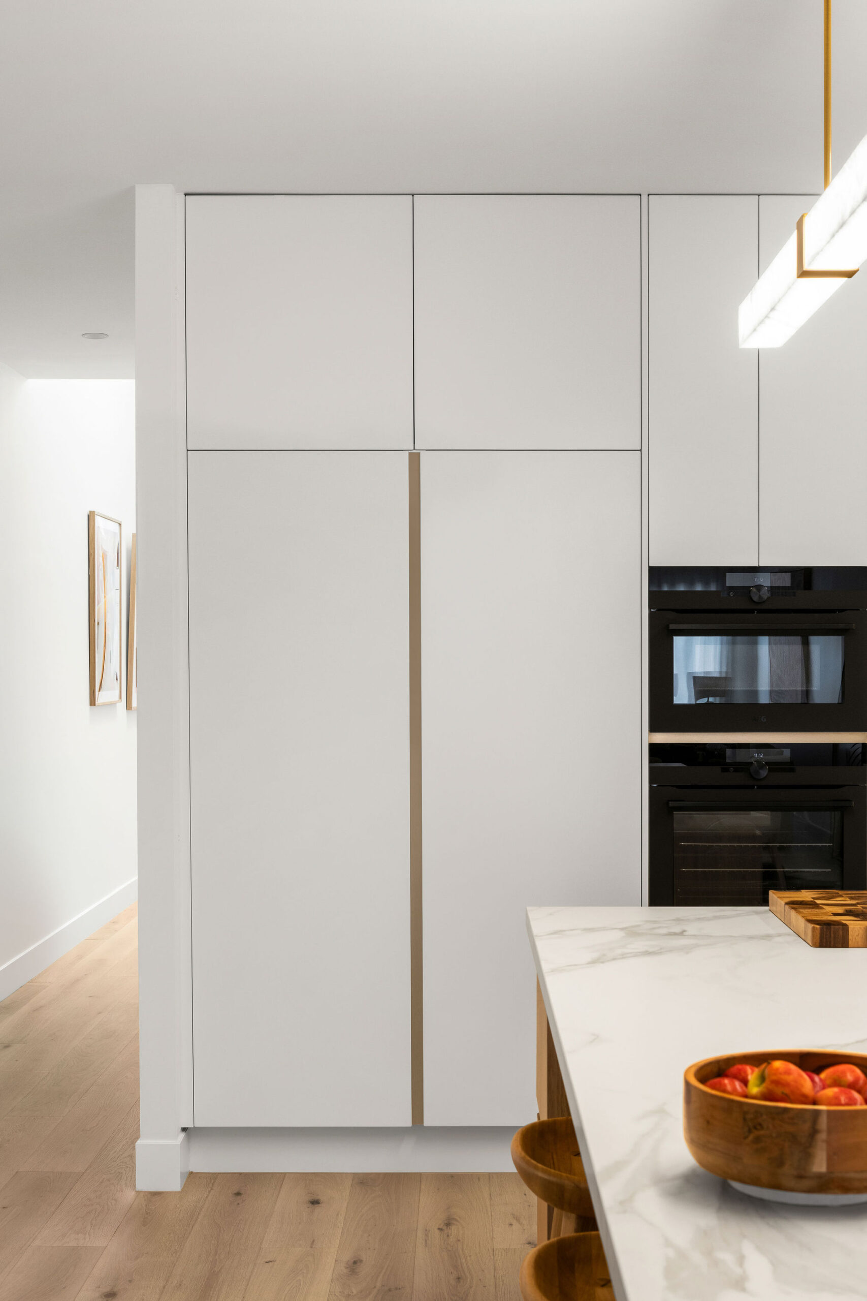 White Kitchen with Integrated fridge and freezer panels